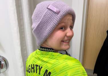 Pediatric patient smiling looking at the camera.